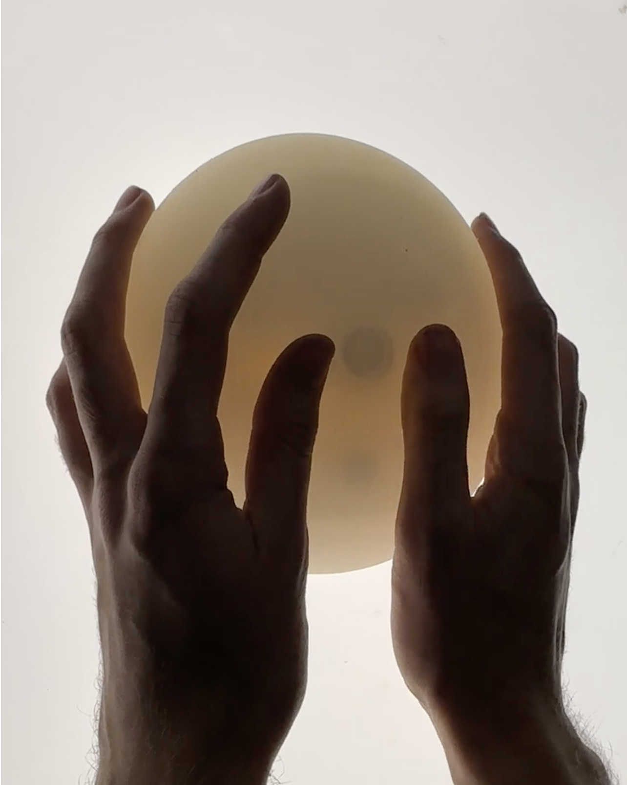 Keunwook's Memory Object, a glowing sphere held in cupped hands